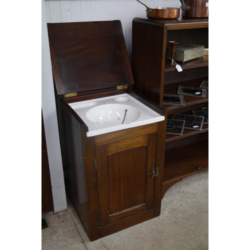 2141 - A mahogany cupboard with ceramic sink to interior