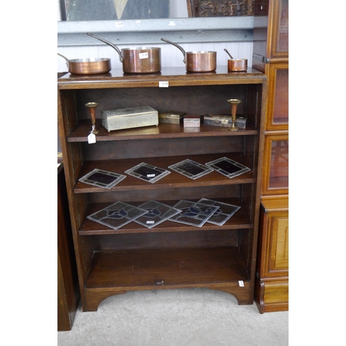 2149 - An 1930's oak bookcase with adjustable shelves