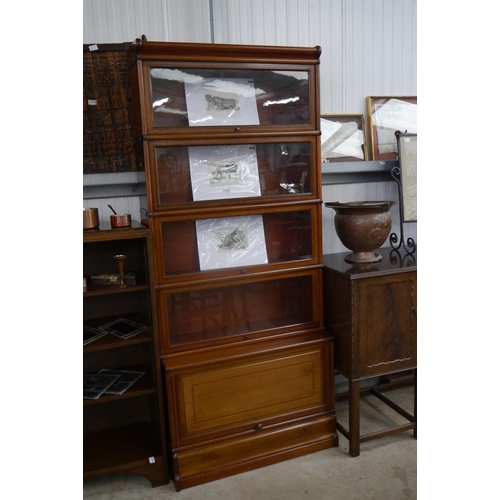 2151 - An Edwardian mahogany five section stacking bookcase with front