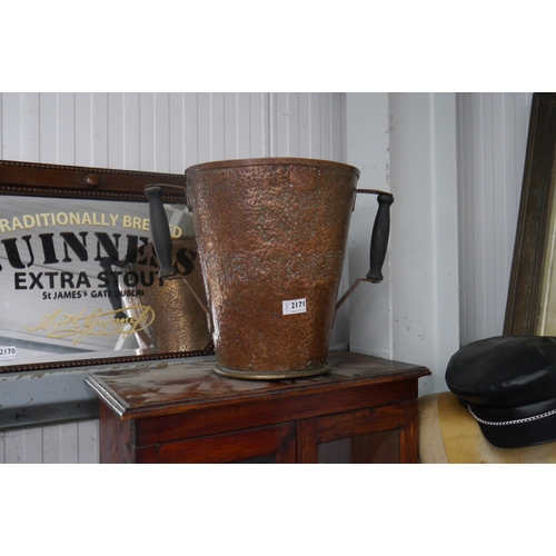 2171 - A 19th Century worked copper twin handle bucket