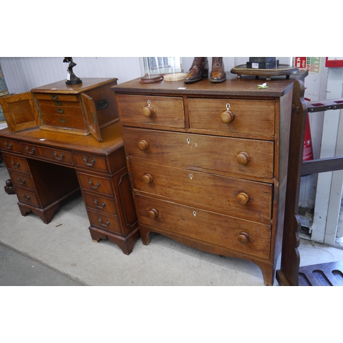 2181 - A Georgian mahogany two over three split chest of drawers