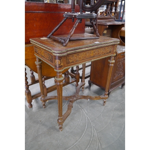 2241 - A French fold-up ladies desk, veneer missing to top