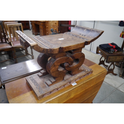 2251 - A West African carved hardwood wisdom knot stool