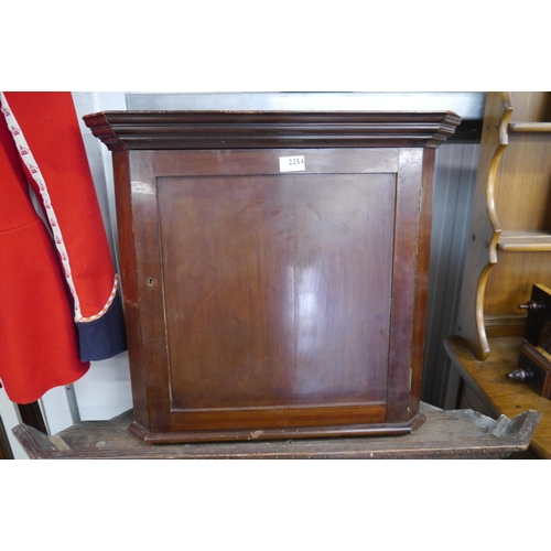 2254 - An Edwardian mahogany corner cabinet