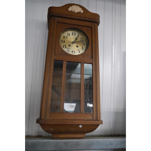 2255 - A 1940's oak cased wall clock