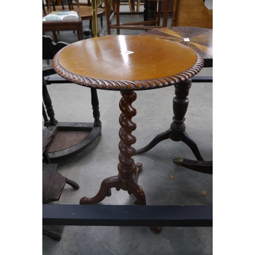 2272 - A 19th Century mahogany wine table on barley-twist stem