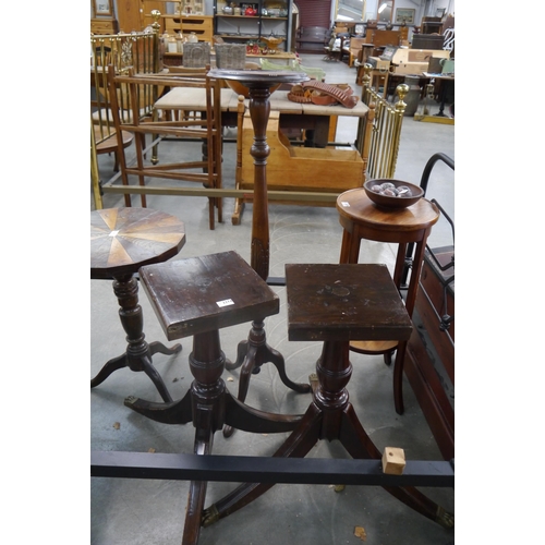 2274 - A pair of mahogany tripod table bases on brass hairy paw feet