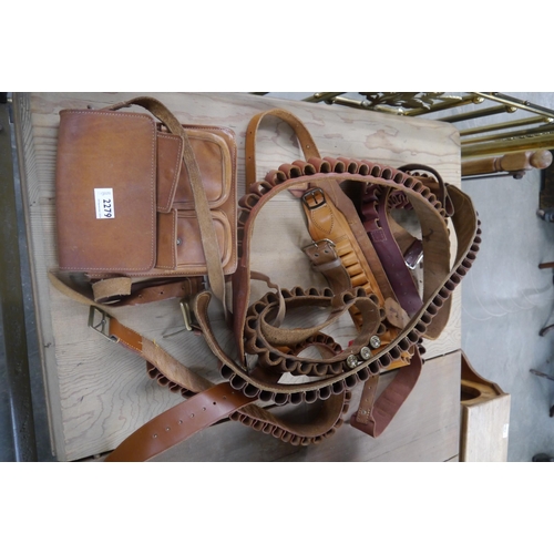 2279 - Seven leather cardridge belts and cartridge bag