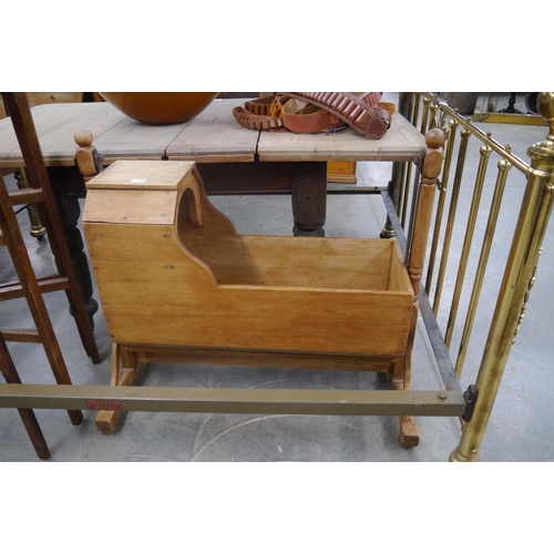 2283 - A 19th Century pine rocking cot on stand