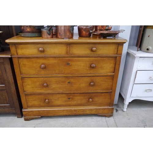 2300 - A 19th Century Continental walnut chest of two over three drawers