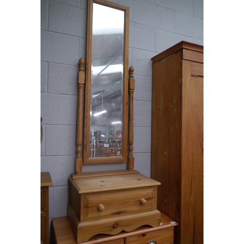 2351 - A pine cheval mirror on single drawer base