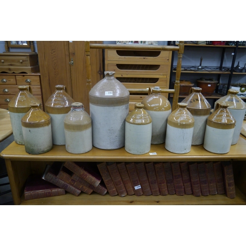 2384 - Eleven stoneware flagons