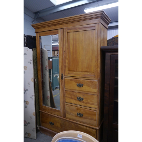 2397 - An Edwardian satinwood wardrobe