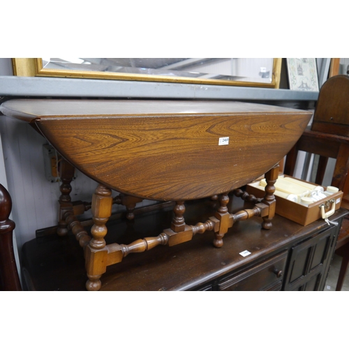 2469 - An Ercol drop-flap coffee table