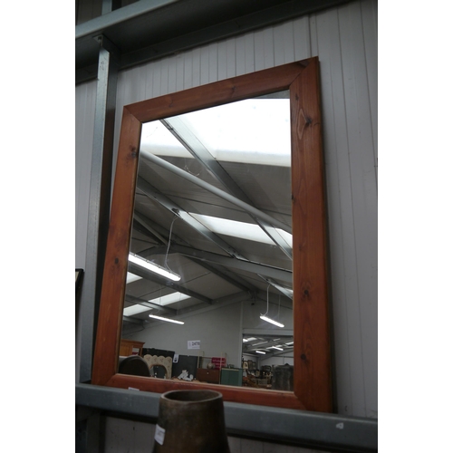 2478 - A pine framed wall mirror