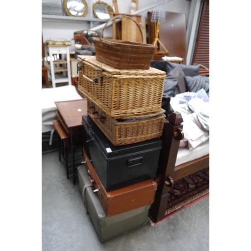 2502 - Six mixed wicker and tin trunks