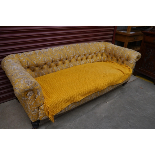 2512 - A Victorian chesterfield sofa, material a/f