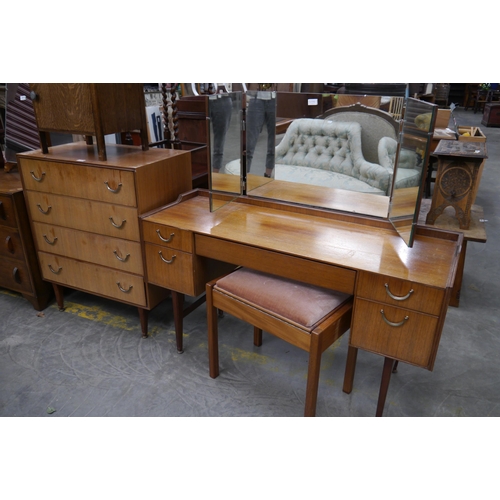 2516 - A 1970's mahogany chest of four drawers and matching dressing table