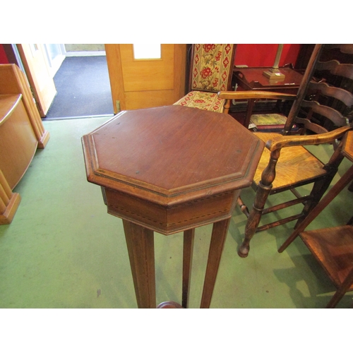 4053 - An Edwardian mahogany octagonal top jardiniere stand with crossbanded inlay, 92cm tall