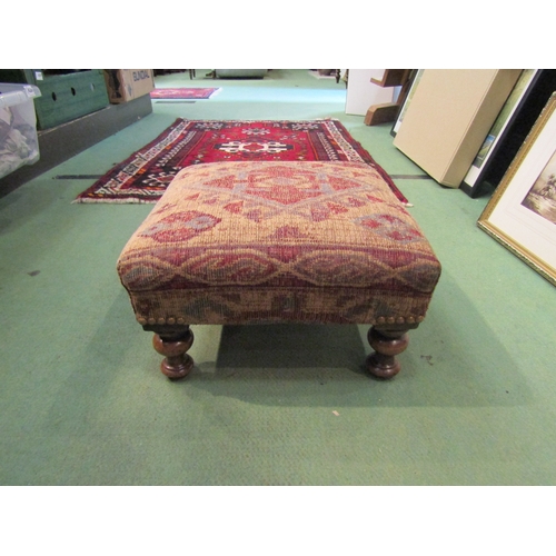 4287 - A 19th Century square foot stool, the upholstered top on four turned legs, re-covered