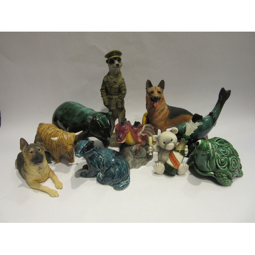 4527 - A box of glass and ceramic animal figures including a Meerkat, Badger, Bull and Dogs