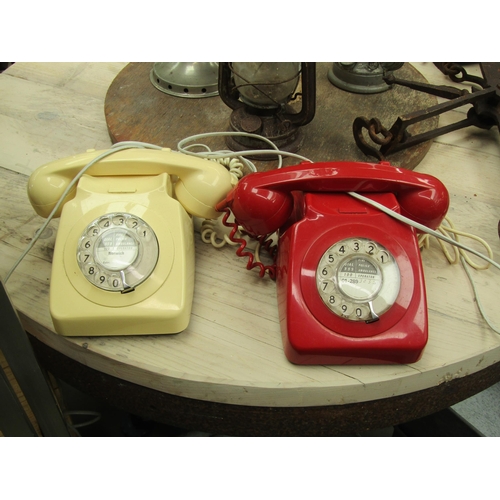 2050 - Two red and cream dial telephones