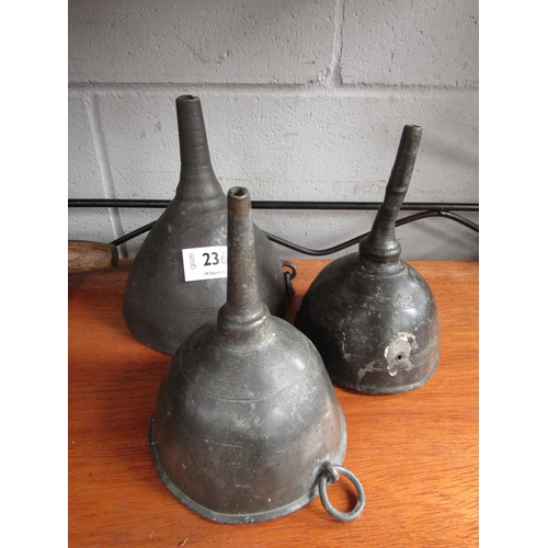 2368 - Three 19th Century Pewter wine funnels