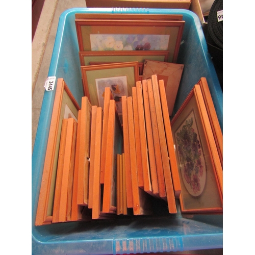 2445 - A box of pictures and prints