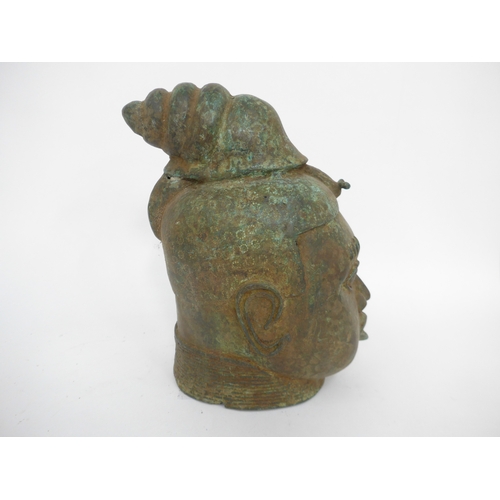 6314 - An African Benin bronze Oba King head surmounted by a snail, holes present in casting. 28cm x 13cmx ... 