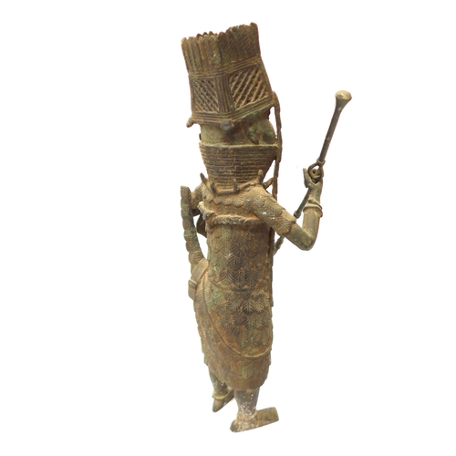 6295 - An Edo Benin bronze sculpture of a standing male warrior with spear and shield, 43cm tall