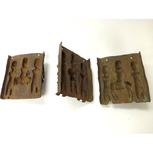 6296 - Six Edo Benin relief plaques of rectangular form. Three depicting Oba, on horseback, the backgrounds... 