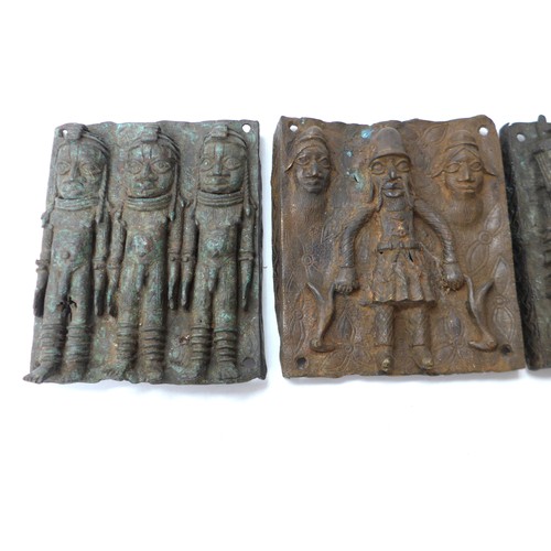 6296 - Six Edo Benin relief plaques of rectangular form. Three depicting Oba, on horseback, the backgrounds... 