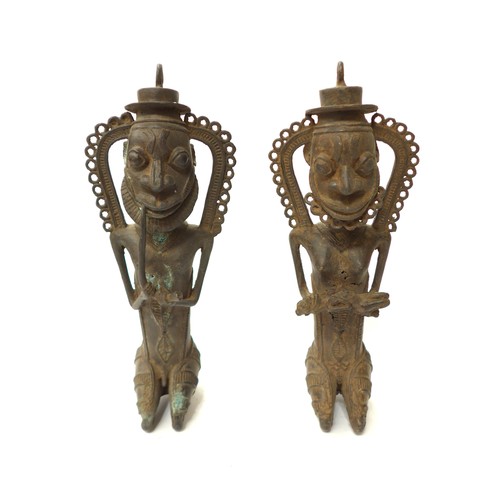 6293 - Two Ogboni bronze statuettes presenting the Chief and his companion holding a child destined to ensu... 