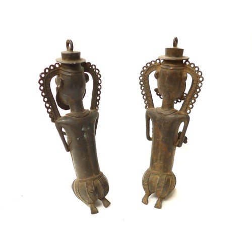 6293 - Two Ogboni bronze statuettes presenting the Chief and his companion holding a child destined to ensu... 