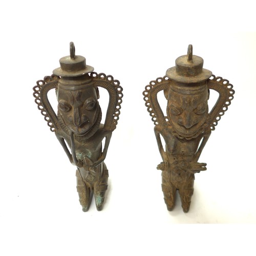 6293 - Two Ogboni bronze statuettes presenting the Chief and his companion holding a child destined to ensu... 