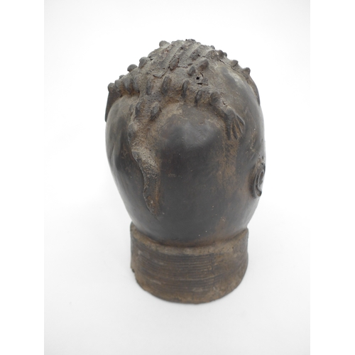 6312 - An African Benin bronze head made by Edo most likely representing the head of the King, the head sur... 