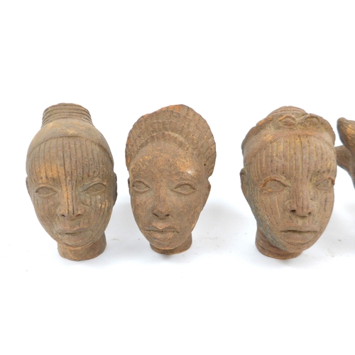 6319 - Benin commemorative terracotta human head depictions with varying hair styles. Two with open tops, t... 