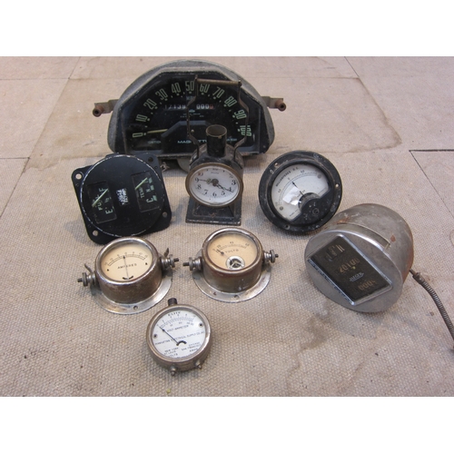 5045 - A box containing speedometers and gauges