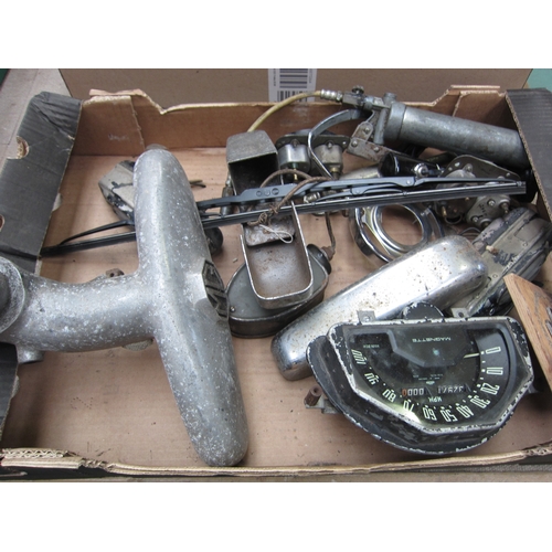 5059 - A box of MG Magnette spares including a badge, speedometer, etc