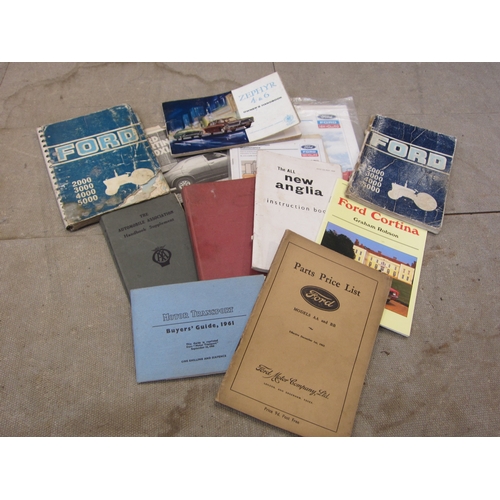 5079 - A box of mixed Ford related manuals, etc including Cortina