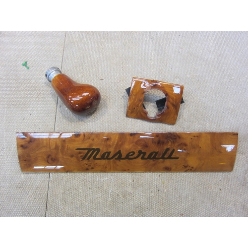 5092 - Two Maserati wooden trims and a polished wood gear knob