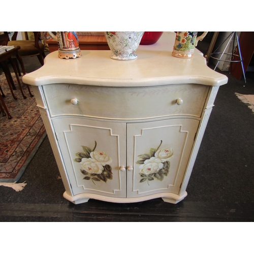 1170 - A French 19th Century style serpentine front cabinet, the single drawer over a two door cupboard hav... 