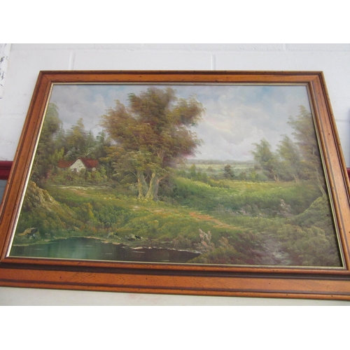 1308 - An unsigned oil on canvas depicting a cottage in a meadow, in wooden frame. 50cm x 75cm image size