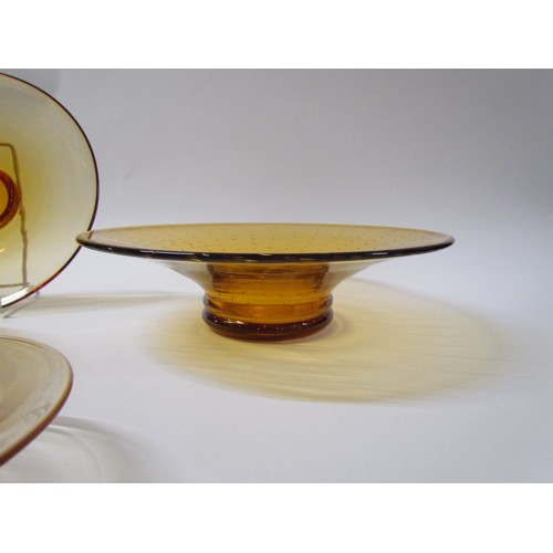 1321 - Four Amber glass bowls including Whitefriars trailed example.  Largest diameter 29.5cm