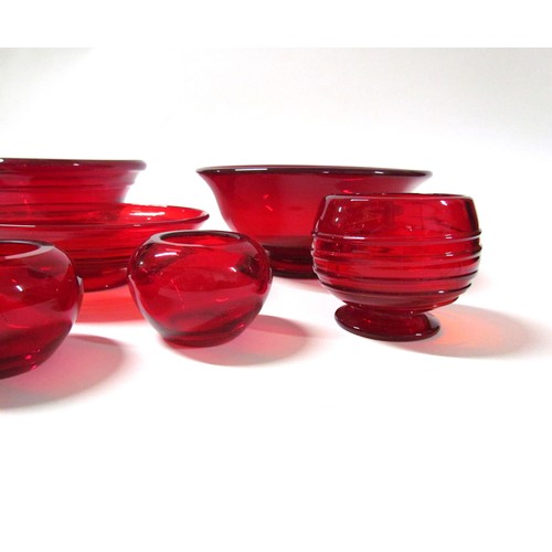 1326 - A collection of Whitefriars Ruby glass including Powell trailed bowls.  Largest diameter 23cm, heigh... 