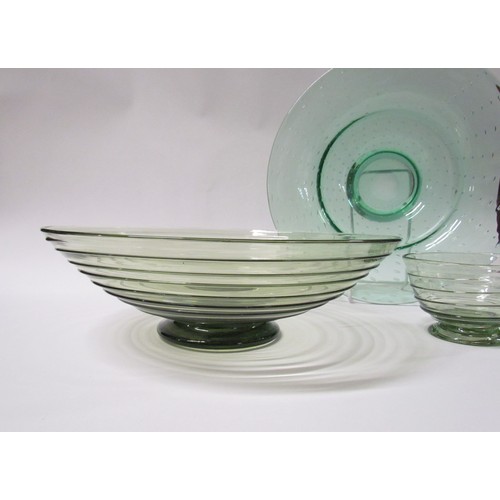 1328 - A Whitefriars green glass trailed bowl, 29cm diameter, similar small bowl, 11.5cm diameter and a gre... 