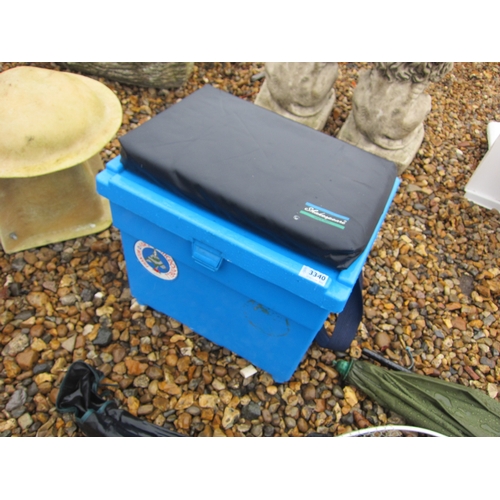 3340 - A fishing box and rods