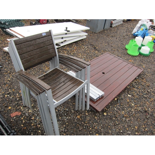 3354 - A wooden and metal framed garden table and four chairs