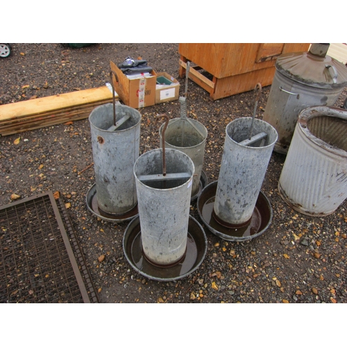 3371 - Four galvanised feeders