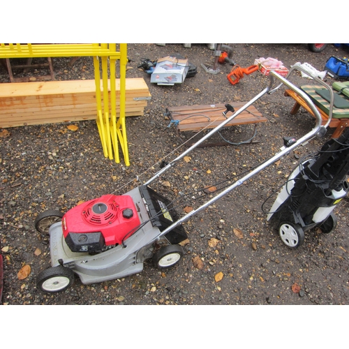 3397 - A Honda petrol lawn mower - no collector